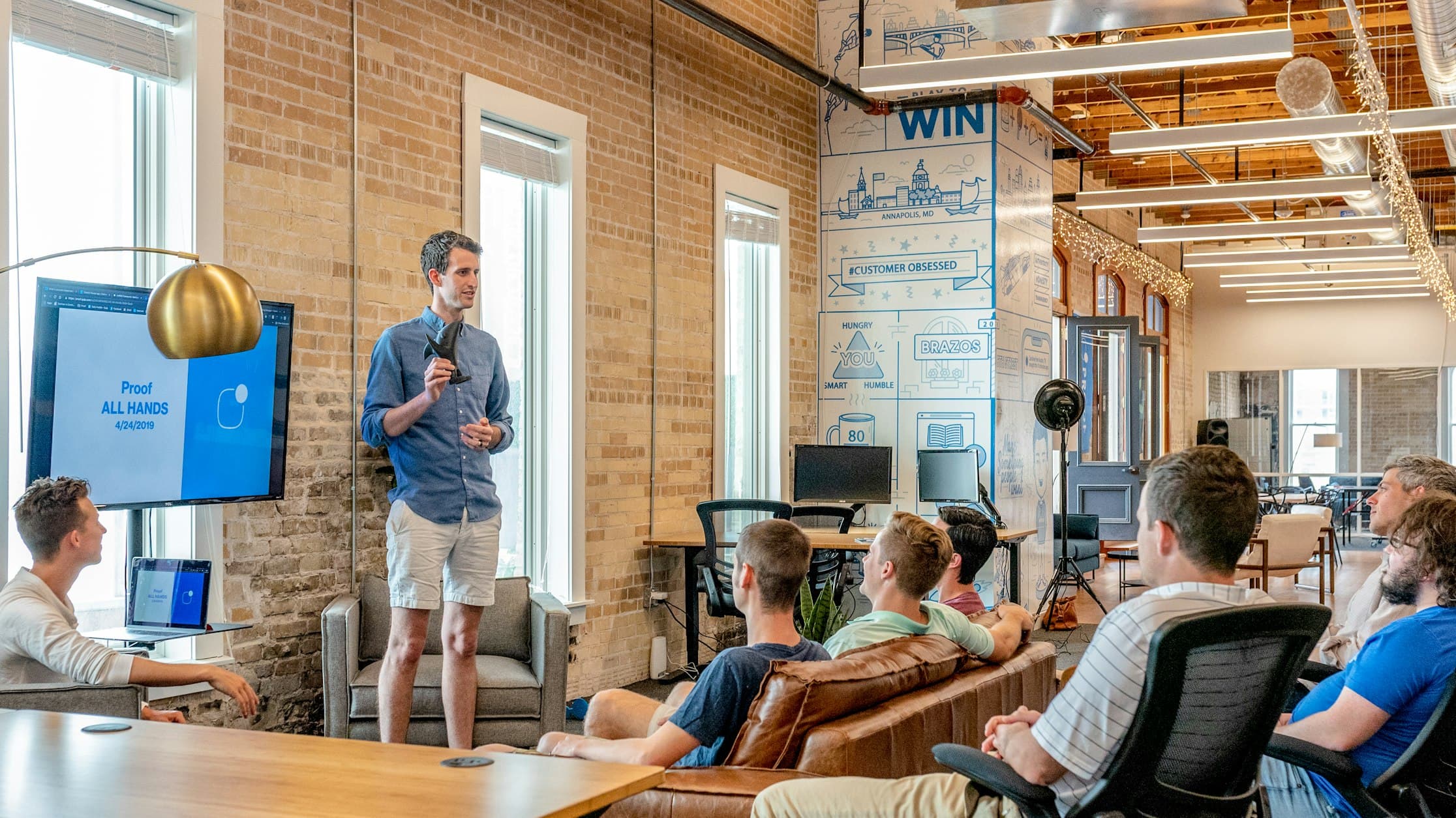 Beseract team collaborating in a modern workspace